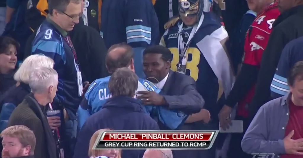 Here I am providing security for Pinball Clemons at the 100th Grey Cup in stock footage.
